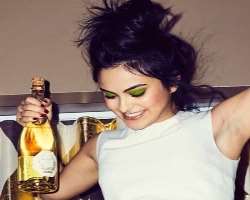 Camila Mendes consuming alcohol